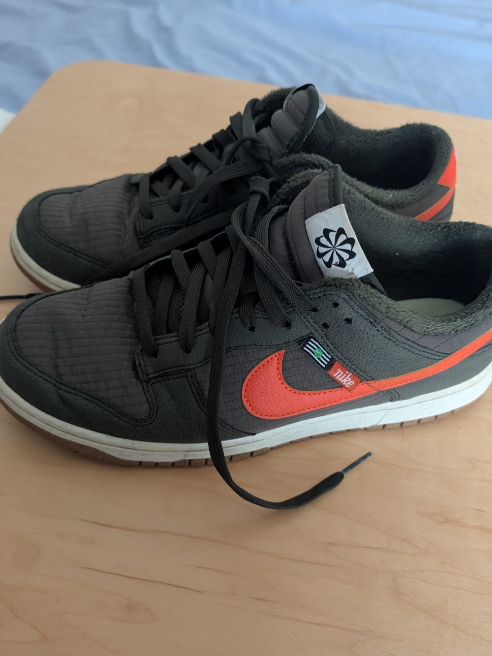 Nike Men’s Low-Top Sneakers in Dark Green with Orange Swoosh